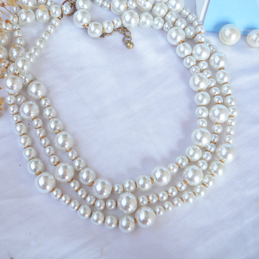 Layered pearl neckpiece